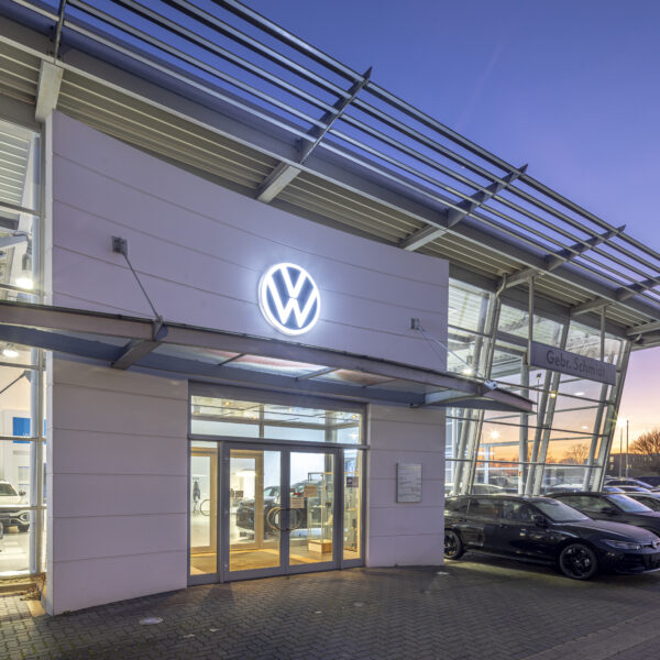 Volkswagen dealership by evening